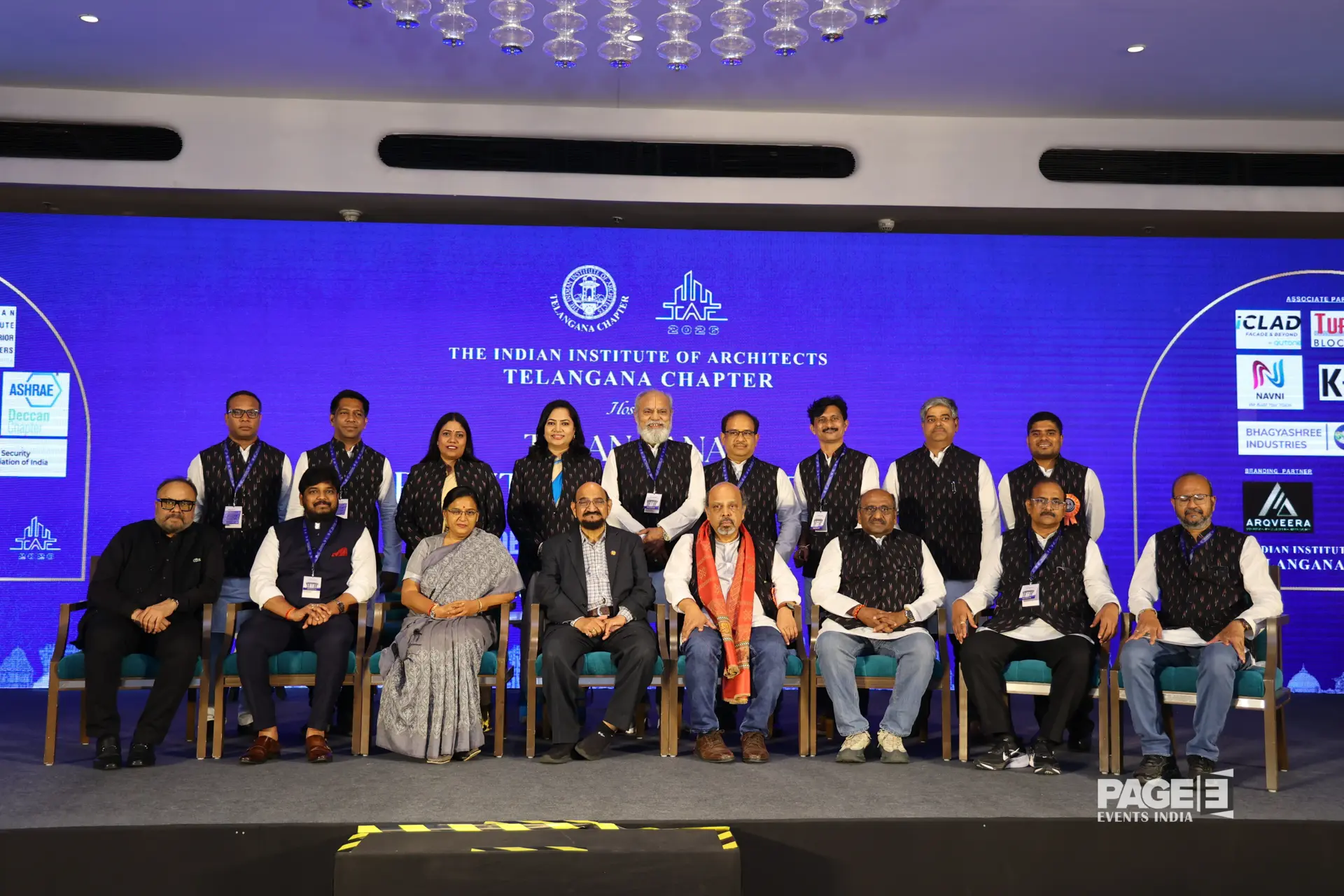 TAF 2026 — IIA Telangana Chapter team in traditional ikat vests